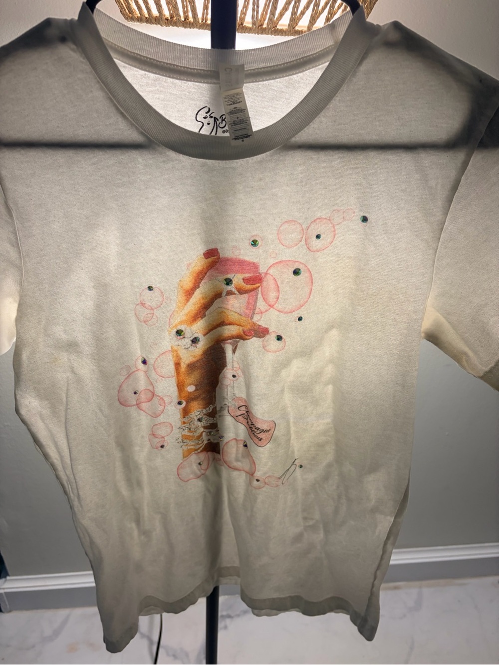 MINT Jodi Arnold Cream Tee with Pink Bubble Hand Graphic